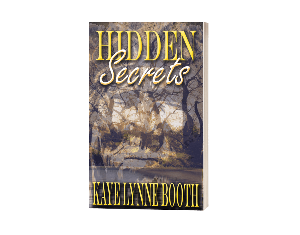Book Cover: river and woods with American Indian face superimposed over it.
Text: Hidden Secrets, Kaye Lynne Booth