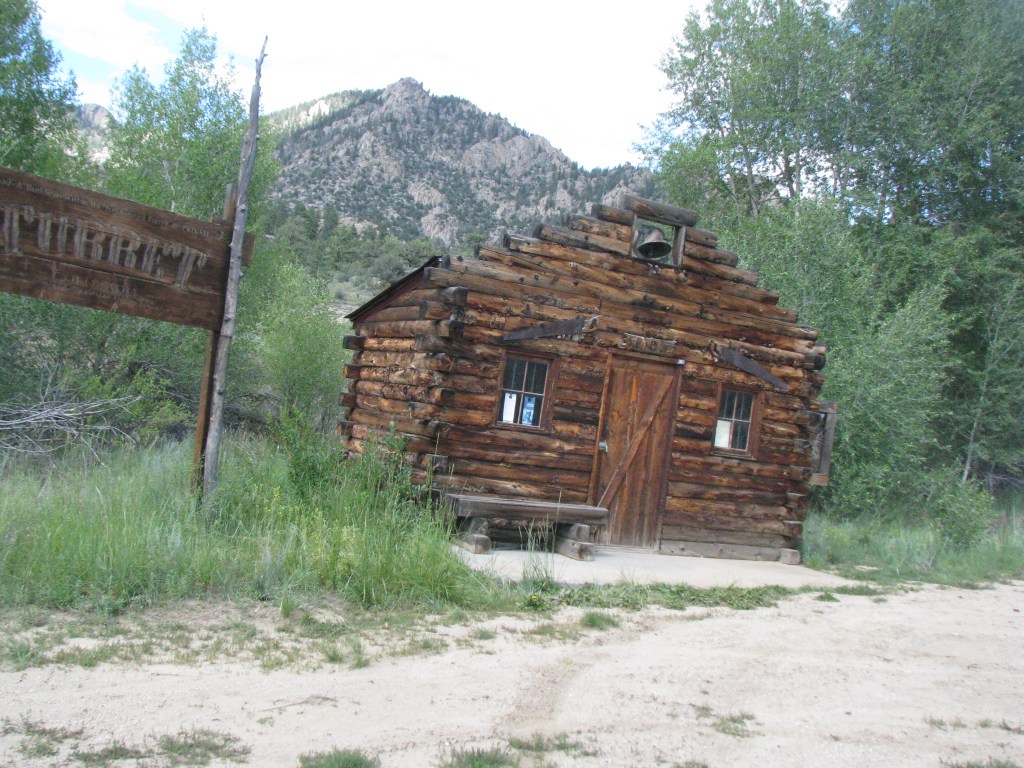 An old schoolhouse, with large bell above the door