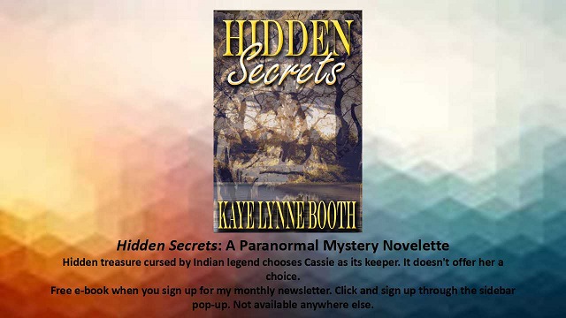 Hidden Secrets on orange and blue abstract background
Text: Hidden Secrets: A Paranormal Mystery Novelette, Hidden treasure cursed by Indian legend chooses Cassie as its keeper. It doesn't offer her a choice.