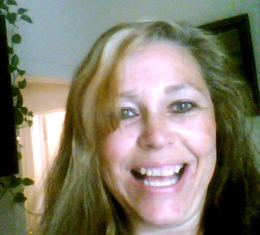 Headshot: Author Kaye Lynne Booth, smiling