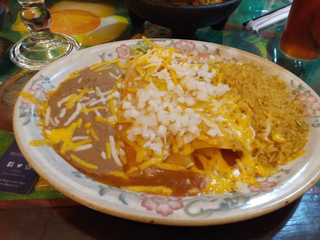 Photo of a cheese enchilada plate.