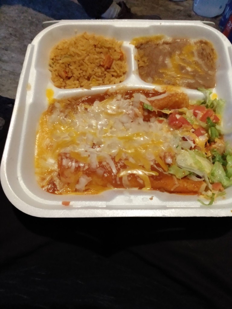 Photo of an enchilada dinner to go.