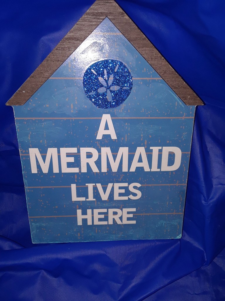 House shaped sign: A Mermaid Lives Here