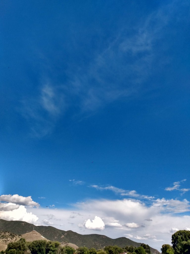 blue sky above mountains
