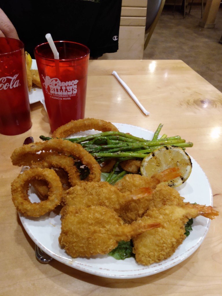 Shrimp, onion rings, and asparagus