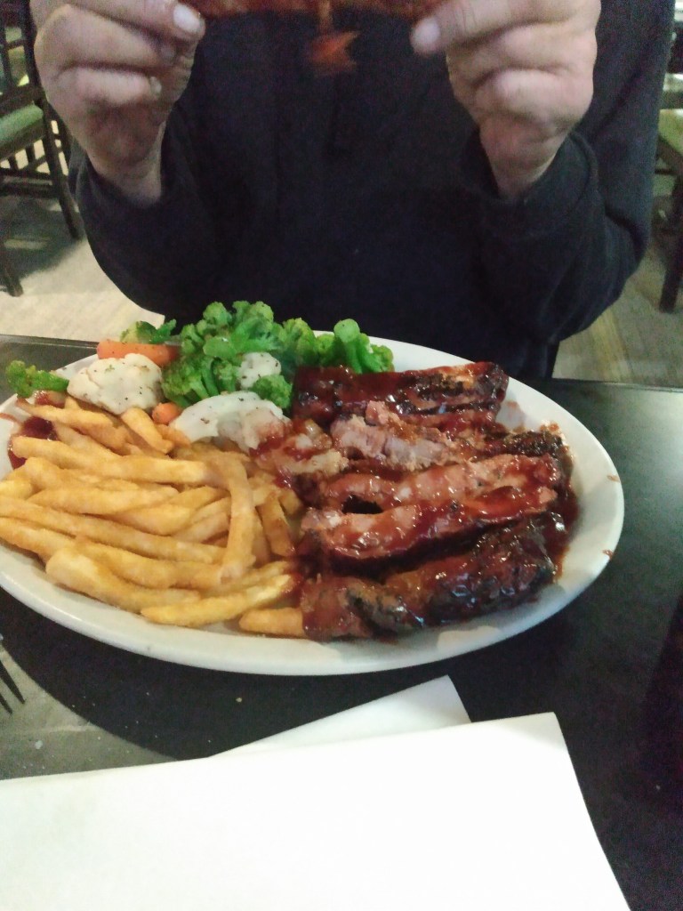 Spare ribs and french fries and vegies