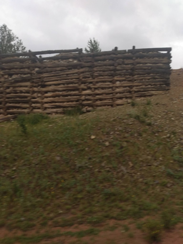 Wooden retainer wall