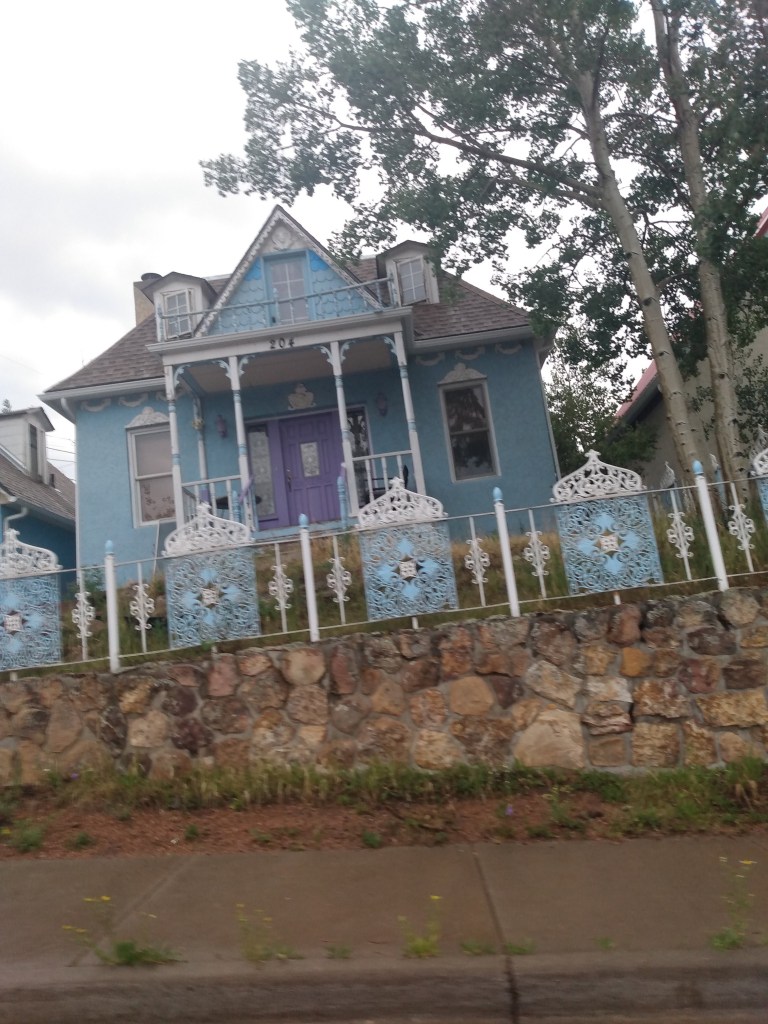 Blue House with Purple Door